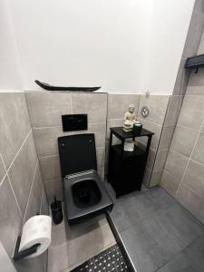 Ένα μπάνιο στο Moderne Stilvolle 2-Zimmer Wohnung in Walle