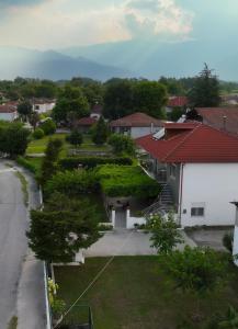 a view of a yard with a house at Xrysa's House in Aridaia