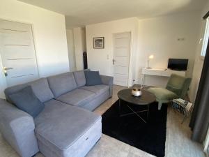Гостиная зона в La Citadelle Appartements