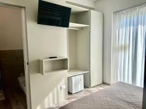 TV a/nebo společenská místnost v ubytování Hotel Madera