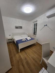 Llit o llits en una habitació de Affittacamere Il Timone