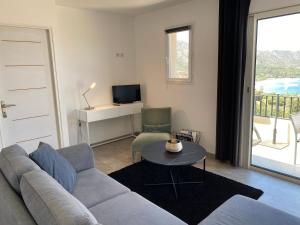 Телевизор и/или развлекательный центр в La Citadelle Appartements