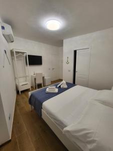 Llit o llits en una habitació de Affittacamere Il Timone