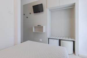 Postel nebo postele na pokoji v ubytování Hotel Madera