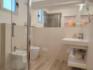 Koupelna v ubytování Hotel Madera