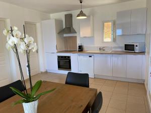 Кухня или мини-кухня в La Citadelle Appartements
