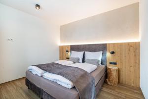 Postel nebo postele na pokoji v ubytování Paflur Lodges Abendrot