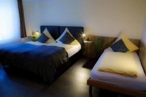 Katil atau katil-katil dalam bilik di Breer S Hotel