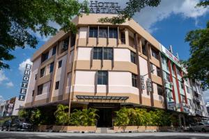 a building with a hotel sign on it at Hotel Eastana Ipoh in Ipoh