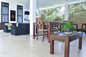 TV a/nebo společenská místnost v ubytování Golden Ray villa