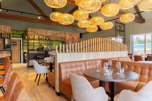 Dormio Resort Berck-sur-Mer tesisinde bir restoran veya yemek mekanı
