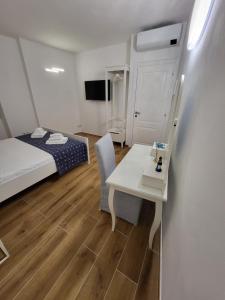Llit o llits en una habitació de Affittacamere Il Timone
