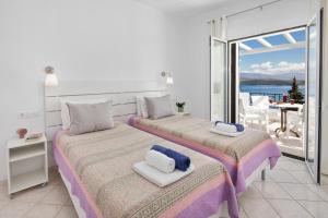 Ένα ή περισσότερα κρεβάτια σε δωμάτιο στο Eleftheria by Vintage Travel +27 φωτογραφίες