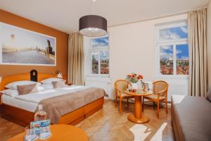 Posteľ alebo postele v izbe v ubytovaní Hotel Merkur - Czech Leading Hotels