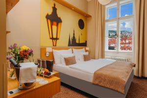 Postel nebo postele na pokoji v ubytování Hotel Adler - Czech Leading Hotels