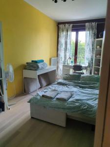 Postel nebo postele na pokoji v ubytování Nowoczesny Apartament 85m2 Muranów, Warszawa - Śródmieście