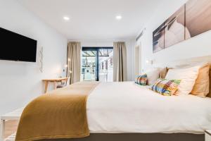 Posteľ alebo postele v izbe v ubytovaní Casa Boissier Ciudad Jardín