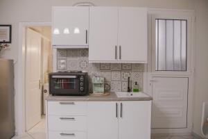 Kjøkken eller kjøkkenkrok på Just A Stay apartement