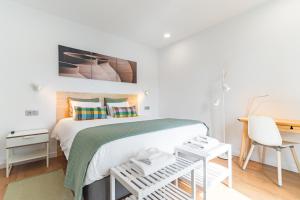 Posteľ alebo postele v izbe v ubytovaní Casa Boissier Ciudad Jardín