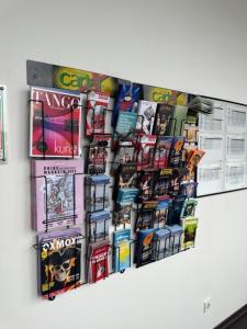 a collage of comic books on a wall at Arena Hostel & Monteurzimmer in Hamburg
