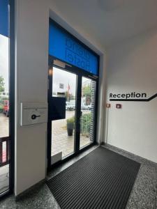 Vstupní hala nebo recepce v ubytování Arena Hostel & Monteurzimmer + 37 fotografií