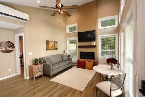 a living room with a couch and a table at the evergreene in Fredericktown