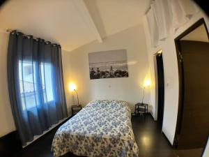 En eller flere senge i et værelse på Maison tranquille dans village