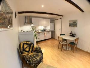 Køkken eller tekøkken på Maison tranquille dans village