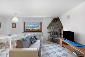 Μια τηλεόραση ή/και κέντρο ψυχαγωγίας στο Casa Sabrina - Appartamento Blu