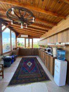 a kitchen with a rug on the floor and a ceiling at Heritage Cave Inn Hotel in Avanos