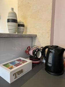 Kavos ir arbatos ruošimo rinkinys apgyvendinimo įstaigoje Holiday Home Zelena Oaza