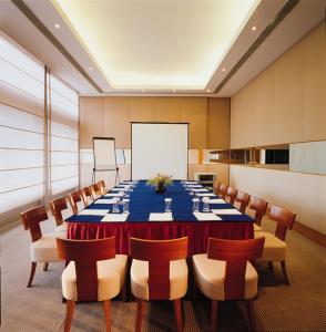 a large conference room with a long table and chairs at Winland 800 Hotel - Formerly Mexan Harbour Hotel in Hong Kong