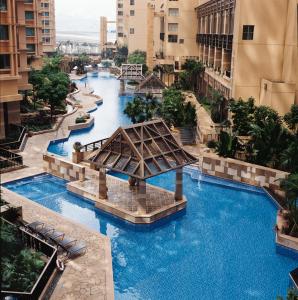 an aerial view of a water park in a city at Winland 800 Hotel - Formerly Mexan Harbour Hotel in Hong Kong