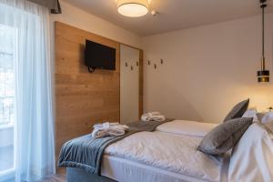 Postel nebo postele na pokoji v ubytování Hotel Meida
