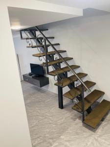 a set of stairs with skateboards on them at Apart-Hotel Vasilisa EVN Airport in Pʼarakʼar