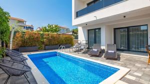 Bazén v ubytování Luxury Villa MetraMaris1 nebo v jeho okolí