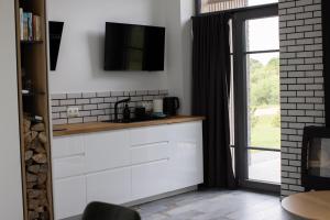 Kuchyň nebo kuchyňský kout v ubytování Utriai Guest Place