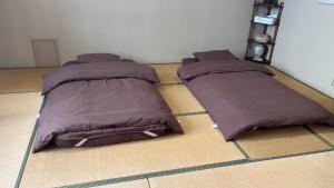 民宿ふじ苑 객실 침대