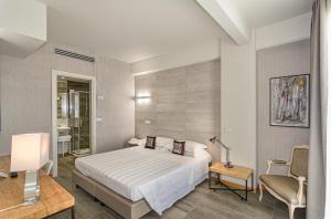 Postel nebo postele na pokoji v ubytování Hotel Joseph