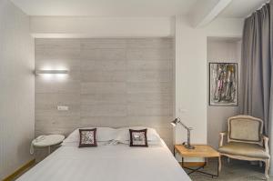Postel nebo postele na pokoji v ubytování Hotel Joseph