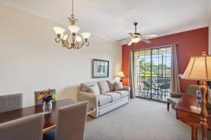 a living room with a couch and a table at 2 bedroom Tampa Condo at Private Golf Course condo in Tampa