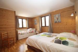 מיטה או מיטות בחדר ב-Chalet Canigou: familial, raffiné, rénové