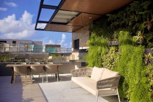 Imagen de la galería de Fortuna #306 - Playa de Cabo Branco por Carpediem, en João Pessoa