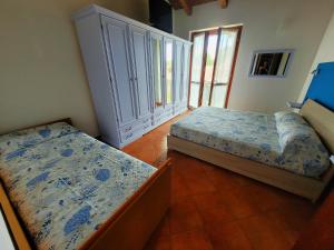 Ένα ή περισσότερα κρεβάτια σε δωμάτιο στο CASA NICCA