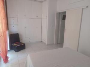 Postel nebo postele na pokoji v ubytování Pireas view