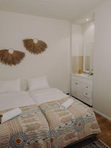 Postel nebo postele na pokoji v ubytování Hippie House היפי האוס