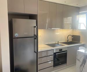 Η κουζίνα ή μικρή κουζίνα στο Loutraki Apartment