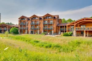 an exterior view of a large apartment building at Wisconsin Dells Condo with Pool and Resort Amenities! in Wisconsin Dells