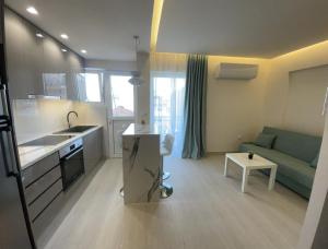 Η κουζίνα ή μικρή κουζίνα στο Loutraki Apartment