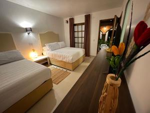 Cama o camas de una habitación en Hotel RioMiel Tlaxcala